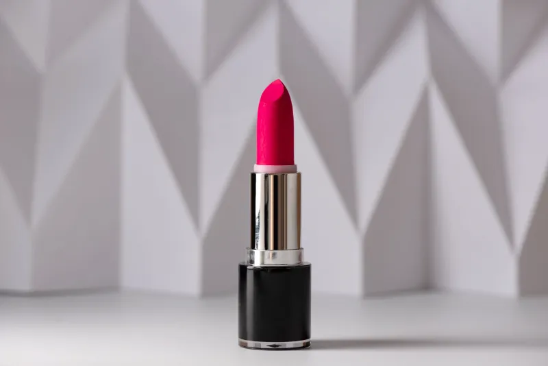 red-lipstick-on-raised-white-chevron-product-and-2023-11-27-05-25-46-utc-1-scaled